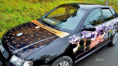 Mit Autogrammen beklebter Audi A3