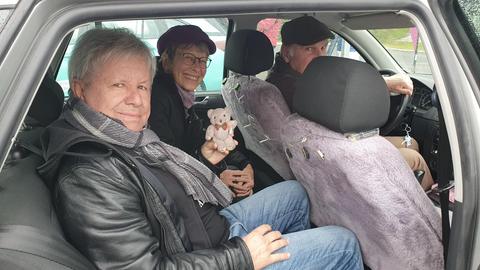 G. G. Anderson mit Sigrid und Dieter Koller im Auto
